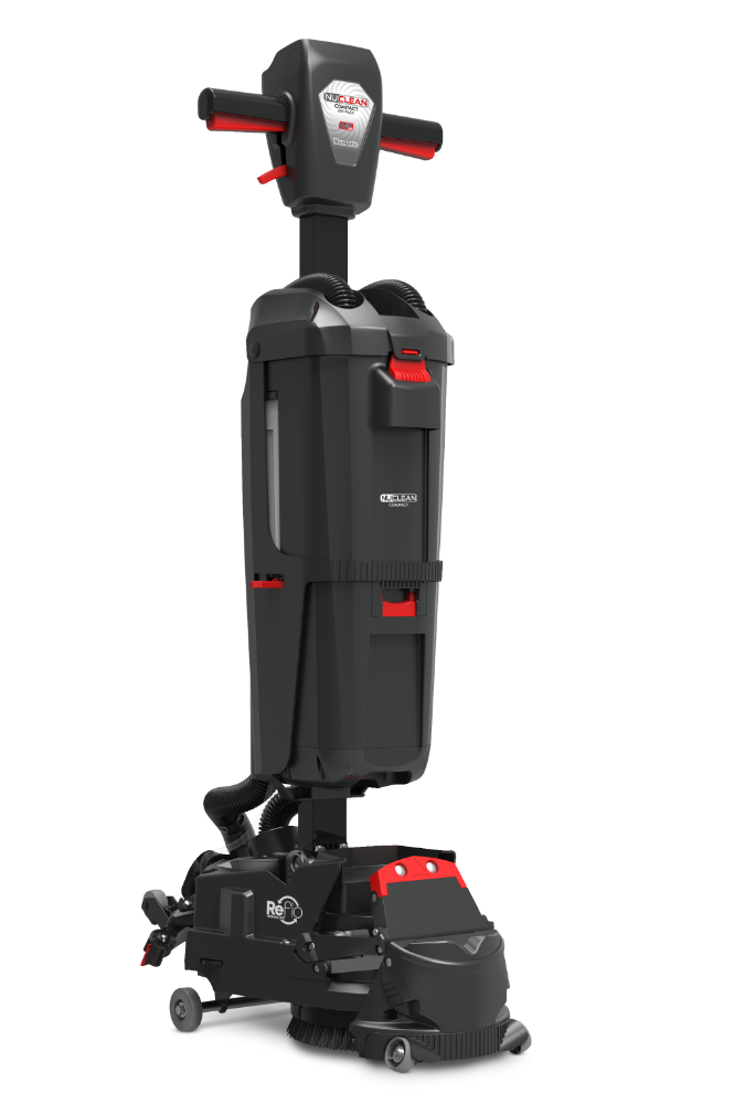 A Numatic 220NX compact floor scrubber dryer in an upright, parked position, viewed from the front-right angle.